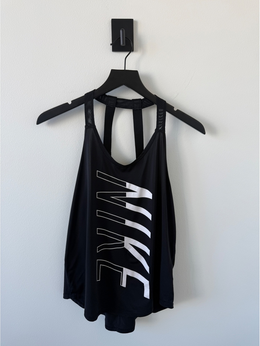 Nike Women's Black Athletic Tank Top with Logo Print and Unique Back Strap Detai